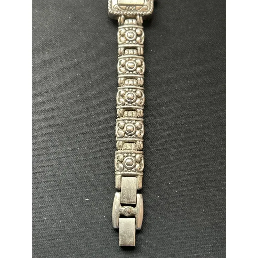 Attitude silver tone